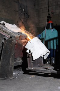Pouring Into A Ladle